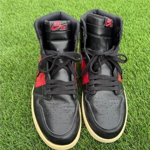 Red and Black men’s Jordan 1s high tops